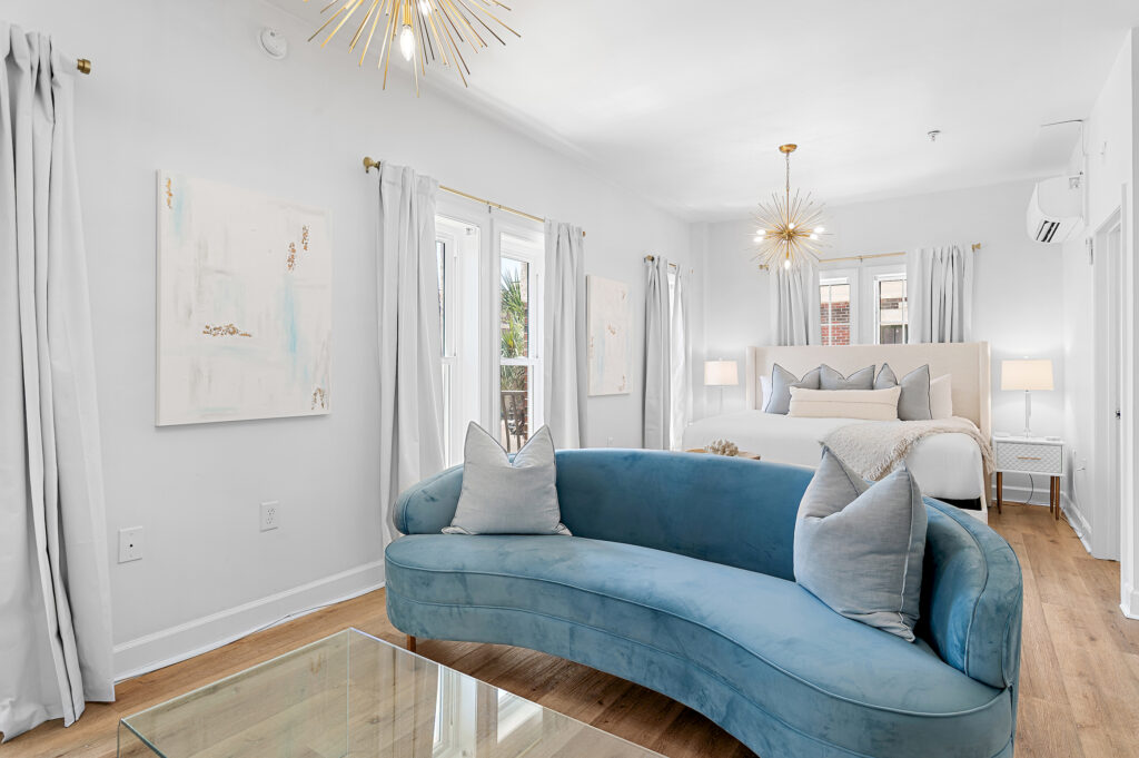Sea Mist studio interior with comfortable seating and king bed