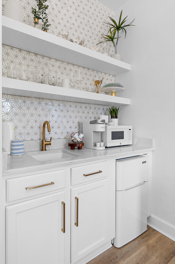 Sea Mist kitchenette with mini refrigerator microwave and coffee setup