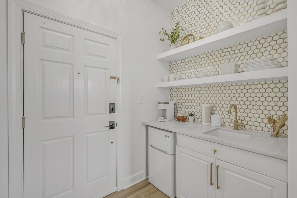 Sea Pearl kitchenette with mini refrigerator microwave and coffee setup